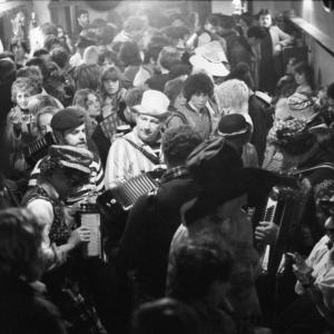 merrymakers in packed pub
