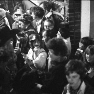 merrymakers in packed pub