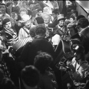 merrymakers in packed pub