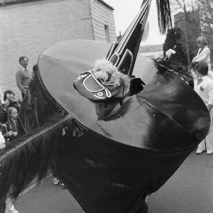 Old Oss dancing, church in background