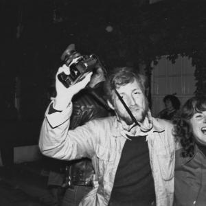man with camera outside