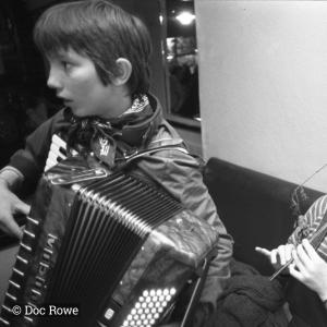 Child and lady playing instruments