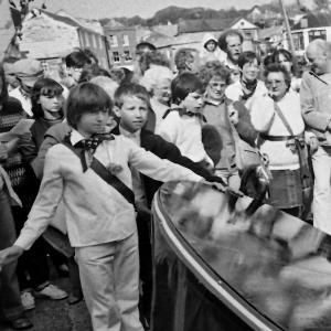 boy teasing blue ribbon oss