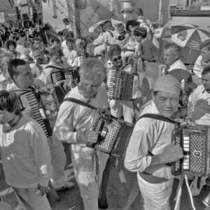 accordion players in procession