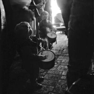 children playing drums in pub