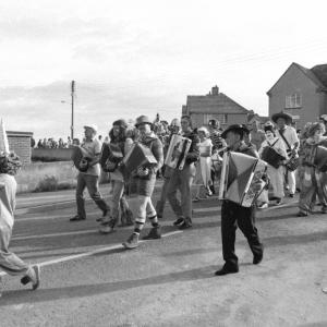 accordion players in road