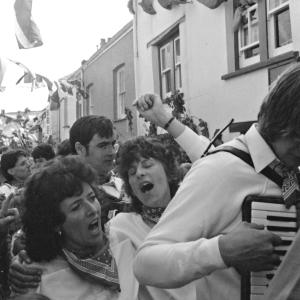 women singing in parade