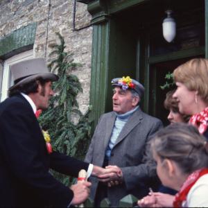 Master of Ceremonies shaking hands with a man