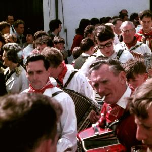 Old Oss band accordion players in crowd