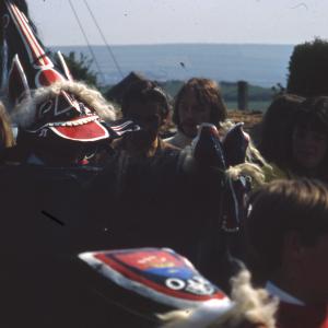 Children's Oss, Old Oss surrounded by people with view out to sea