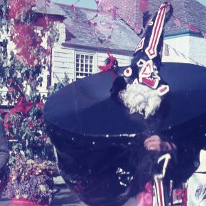 Old Oss and boy stood in front of Maypole
