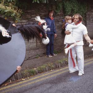 Old Oss and Teaser carrying child