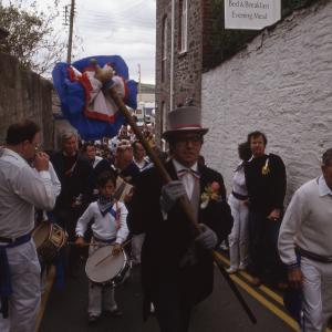 Blue Ribbon Master of Ceremonies leading procession