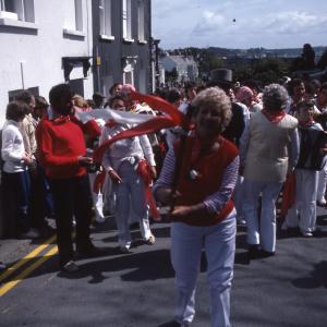 Woman leading Old Oss procession