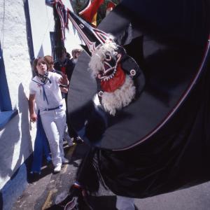 Blue Ribbon Oss dancing in road