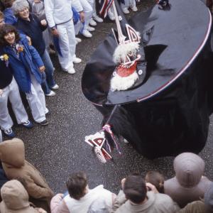 Blue Ribbon Oss dancing beside the harbour
