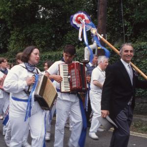 Blue Ribbon Master of Ceremonies walking in procession