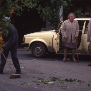 Sweeping the street after put up decorations