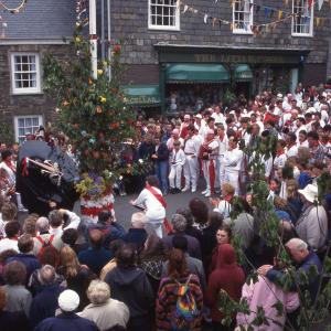 Old Oss being teased under maypole 