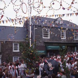 Old Oss being teased under maypole 