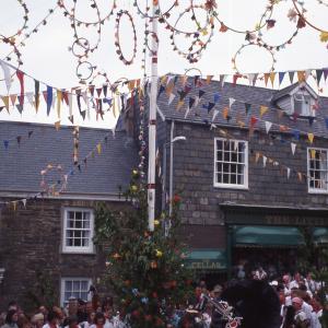 Old Oss being teased under maypole
