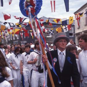 Blue Ribbon Master of Ceremonies walking in procession