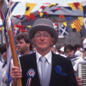 Blue Ribbon Master of Ceremonies walking in procession