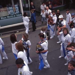 Blue Ribbon accordion players and dancers in town