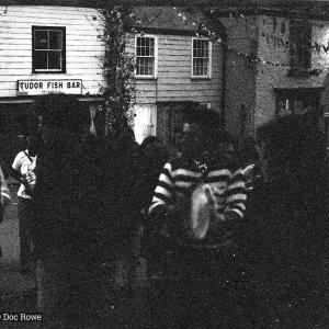 Playing music at night under maypole
