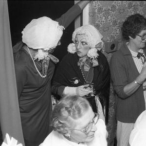 Merrymakers in pub dressed up