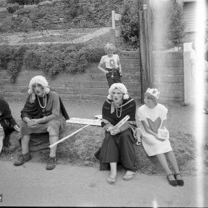 Merrymakers outside in costume