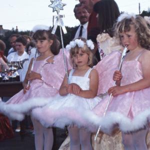 little girl dressed as puppet