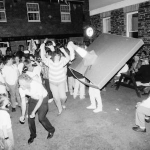 people teasing makeshift oss at night