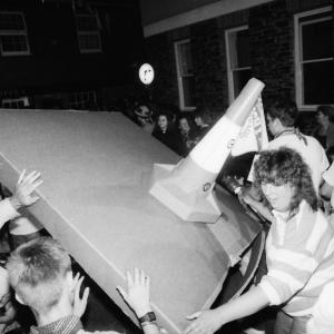 people teasing makeshift oss at night