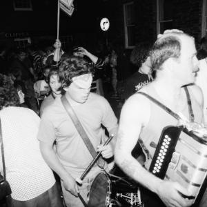 accordion players at night