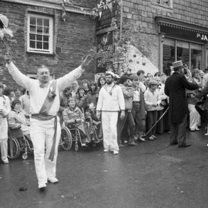 man holding up club