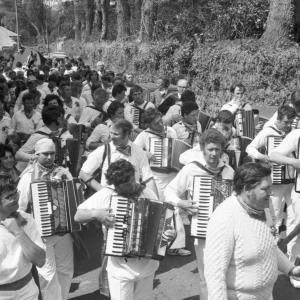 accordion players in procession