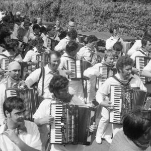 accordion players in procession