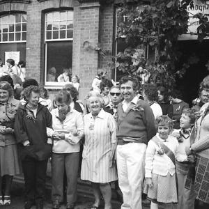 People gathered at 10 O'clock outside The Institute