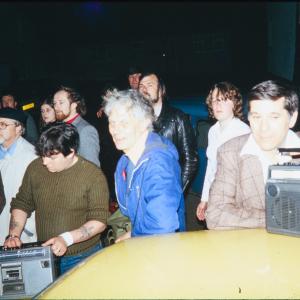 Night time, men with boom boxes