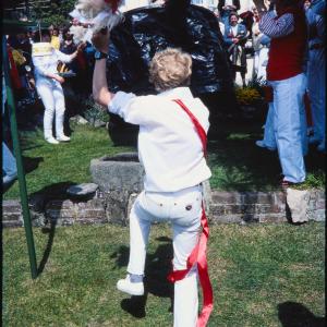 Old Oss being teased in garden of house 