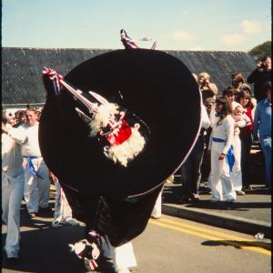 Blue Ribbon Oss dancing in road