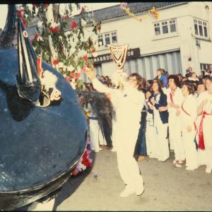 Old Oss being teased under maypole