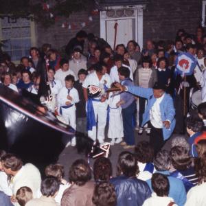 Crowd of Blue Ribbon party looking surprised