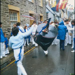 Children's Oss, Blue Ribbon oss being teased in the rain 
