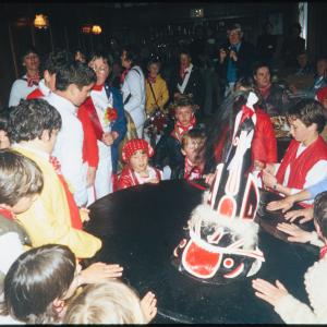 Children circled around Old Oss inside 