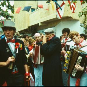 Old Oss Master of Ceremonies with accordion players and harmonica player