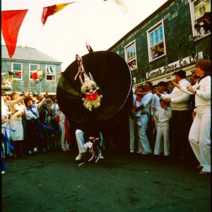 Blue Ribbon Oss dancing, with crowd cheering