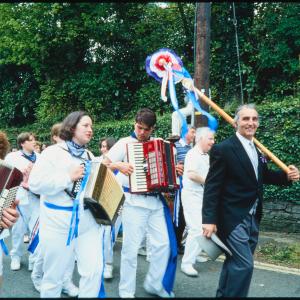 Blue Ribbon Master of Ceremonies walking in procession