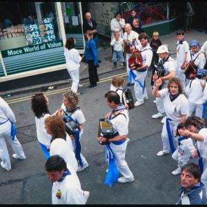 Blue Ribbon accordion players and dancers in town